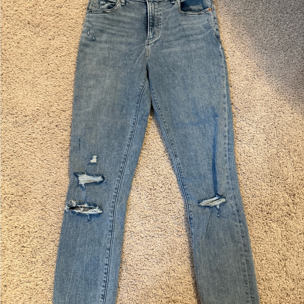Women's Distressed Blue Jeans
